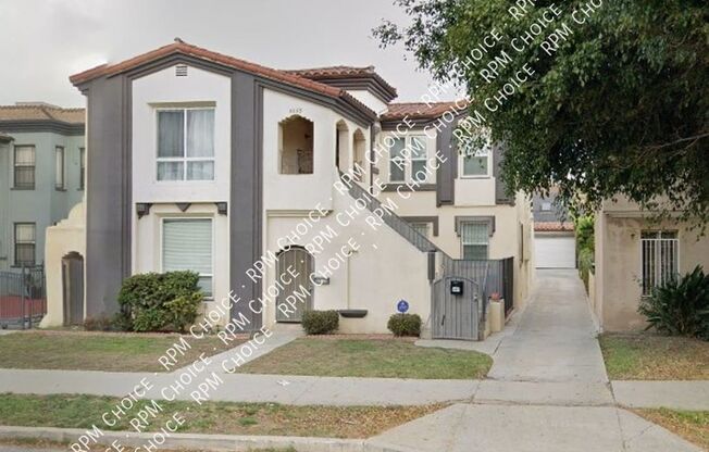 8557 OLYMPIC BLVD