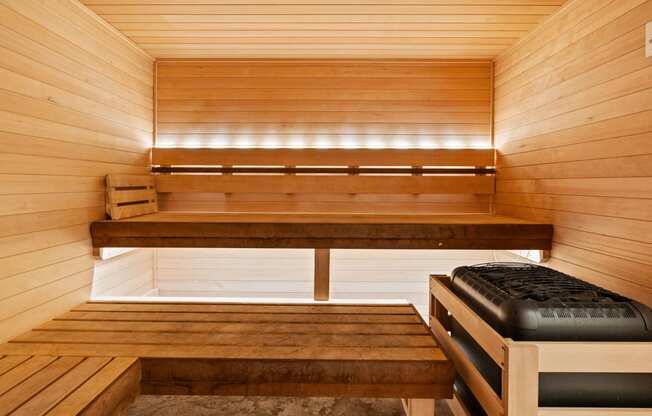 a wooden sauna with benches and a bench seat