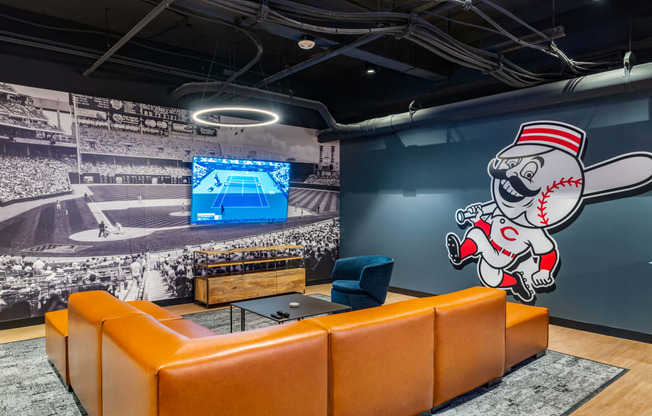 a wall mural of a baseball player in a room