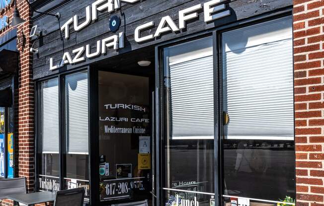 Turkish Cafe with tables and chairs outside, Allston, MA