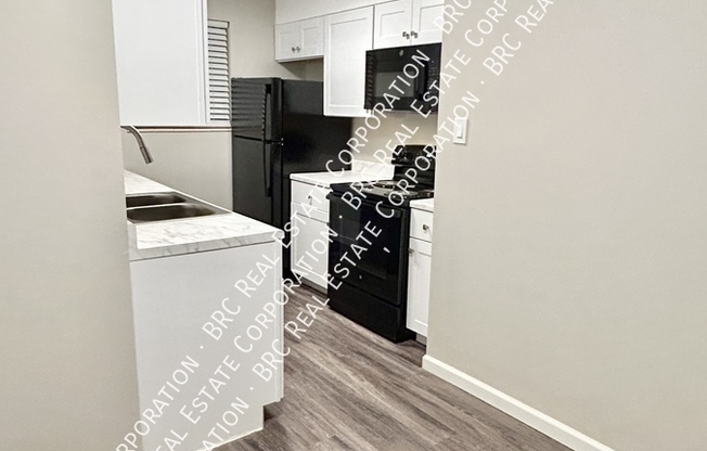 5914 S DATURA ST