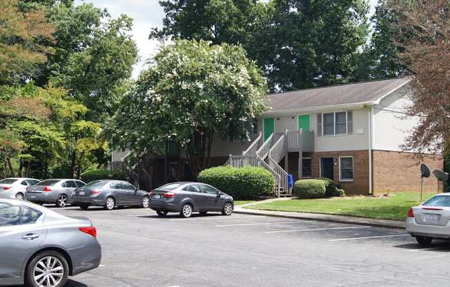 a house with cars parked in front of it