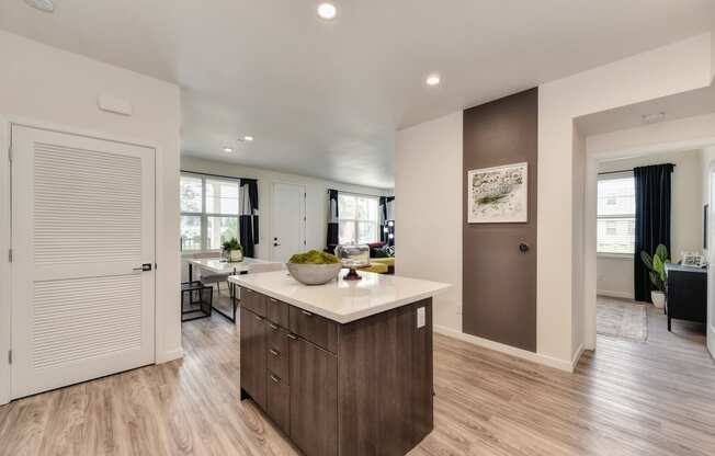 Kitchen with Hardwood Inspired Floor, Cabinets at Morgan Ranch Apartments, Morgan Hill, CA, 95037