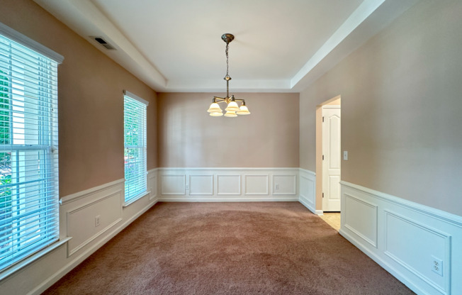 Charming Wakefield Home with First-Floor Bedroom & Primary Suite, Fenced-in Backyard, and Golf Course Views – Available Now!