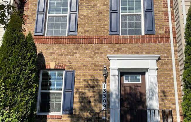 THREE LEVEL TOWNHOUSE WITH 2 CAR GARAGE