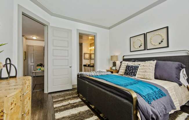 Bedroom with comfy bed at Reveal at Bayside, Rowlett, Texas