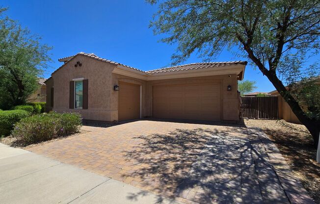 Highly sought after area in Goodyear!  With SOLAR and 3 car garage!