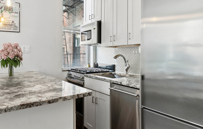 406 W 46 ST
