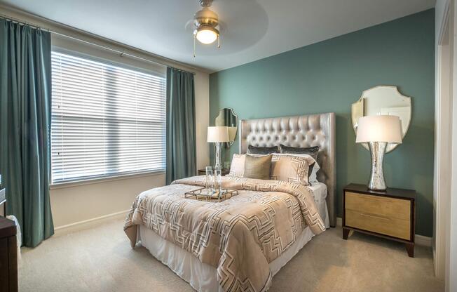 a bedroom with a large bed in a hotel room