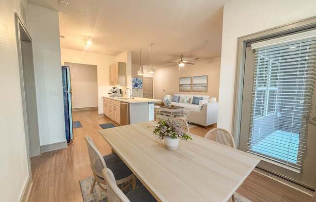 A dining room with a table and chairs is shown.