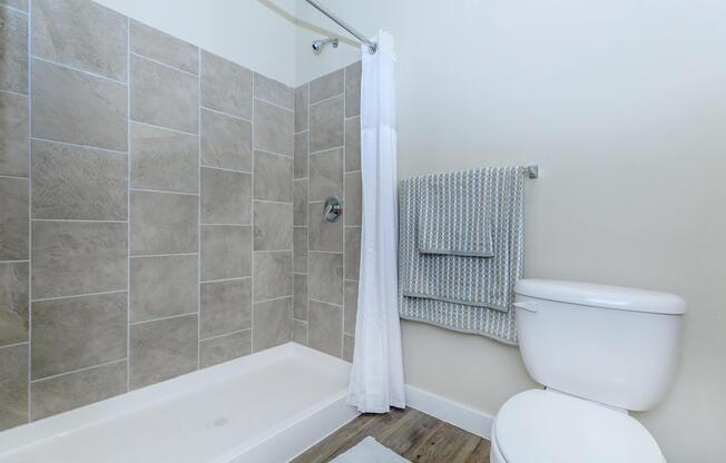 a room with a sink and a bath tub