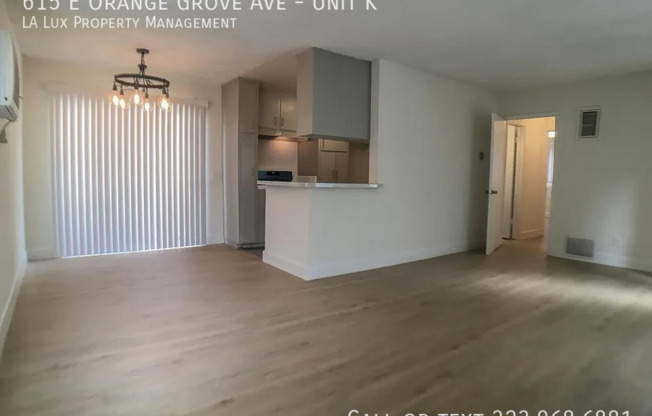 615 E ORANGE GRV AVE