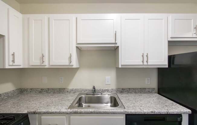 This is a photo of the kitchen in the 543 square foot B-style, 1 bedroom, 1 bath apartment at Blue Grass Manor Apartments in Erlanger, KY.