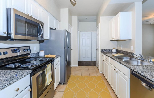 Kitchen appliances and cabinets at The Aliante by Picerne, Arizona, 85259