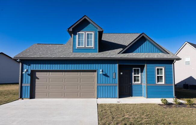 Elegant Home with Stone Fireplace, Kitchen Island and Designer Primary Suite