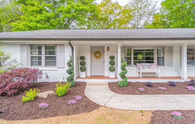 Fully renovated ranch with finished basement, flat fenced in backyard, walking distance to Canton St., Roswell