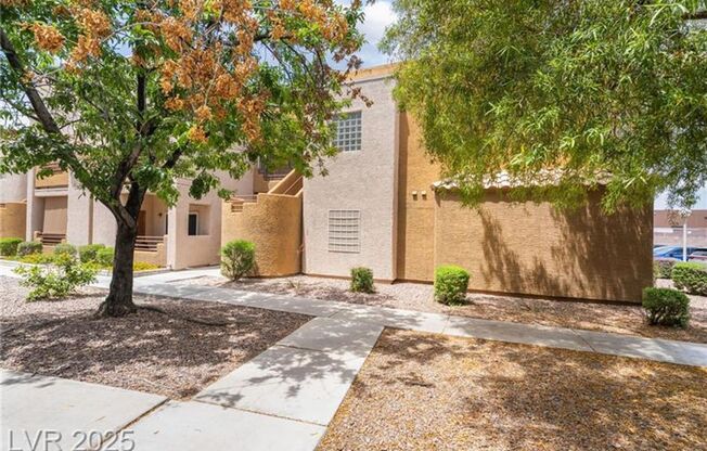 INVITING 2 BEDROOM TOP FLOOR CONDO IN A CENTRAL LOCATION NEAR UNLV AND THE STRIP