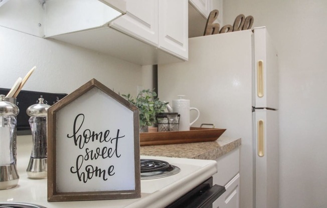 This is a photo of the kitchen in the 653 square foot 1 bedroom apartment at Harvard Square Apartments, in Dallas, TX.