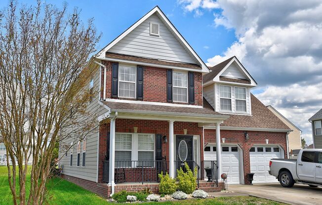 NEWER ESTATE COMMUNITY! CUSTOM BRICK FOUR BEDROOM HOME ADJACENT TO COMMUNITY GREEN SPACE...WELCOME HOME!