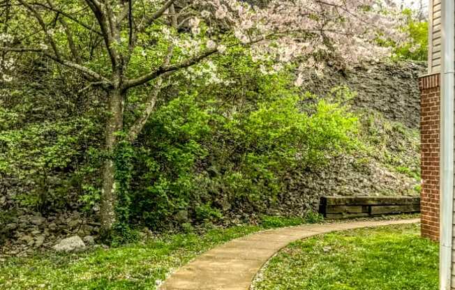 Walking path between buildings at Cobblestone Corners Apartment Homes, Nashville, TN, 37216