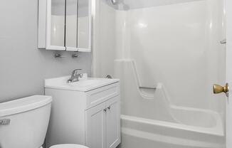 a bathroom with a toilet and a sink at Eagle Pointe New London, CT, 06320