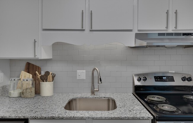 Elevate your culinary routine in the modern kitchen at Icon Downtown Durham. Sleek granite countertops and stainless steel appliances create an inviting space for both daily meals and entertaining. Ready to cook? Schedule a tour today!
