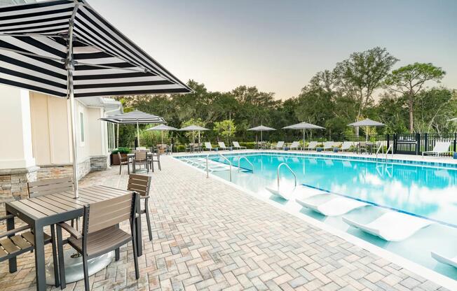 Relax beside the shimmering pool at Amavi Kissimmee, with inviting spaces that keep you close to the everyday conveniences and attractions that define the area.