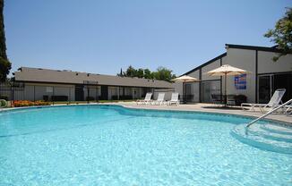 Take a dip in the pool at Westwood Apartments