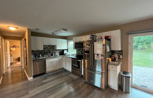 Modern Design 3 bedroom 2 bath home in traditional Orlando neighborhood. HUGE backyard with water views.