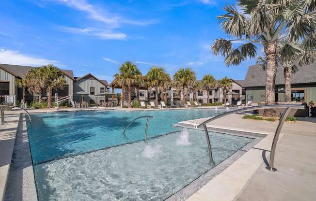 resort style swimming pool with palm trees at Canter, Florida, 34474