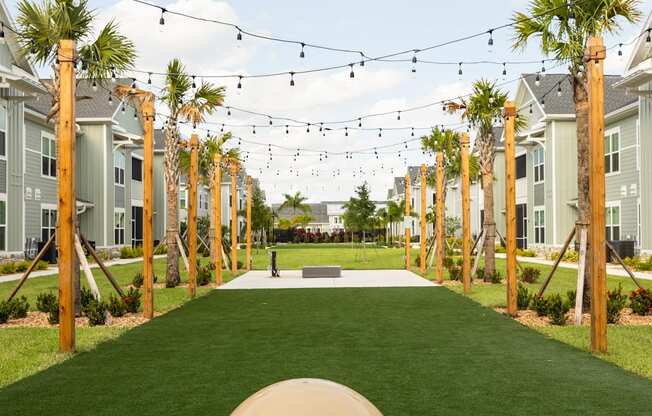 a giant ball in the middle of a lawn in a row of houses at Palm Grove in Ellenton, FL 34222