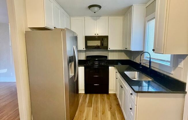 Welcome to Burgess2937, A Newly renovated charming 2-bedroom, 1-bathroom Duplex located in the vibrant city of Charlotte, NC