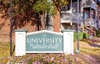 Outdoor picture of sign for University Plaza Apartment Homes