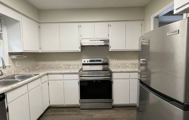 APPLICATION PENDING: 720-A Powell Drive ~Newly Renovated~ End Unit ~ Convenient to Powell Drive Park and NCSU!