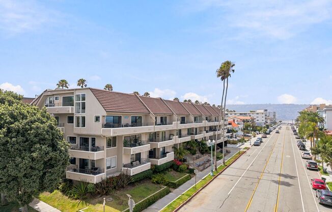 Updated, Bright & Airy Loft-Style Penthouse Condo w/ Ocean Views, Large Rooftop Deck & Balcony & Gated 2-Car Parking in the Exclusive Bay Point Community Just 50 Ft to Beach & Blocks to Hollywood Riviera!