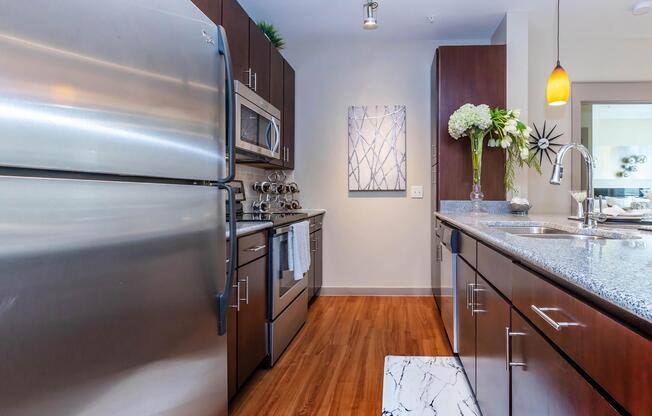 a modern kitchen with stainless steel appliances