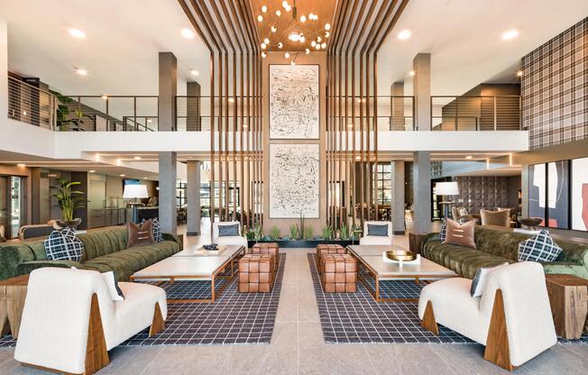 A light-filled lobby welcomes you home with wood detailing, layered seating, and expansive gathering spaces.