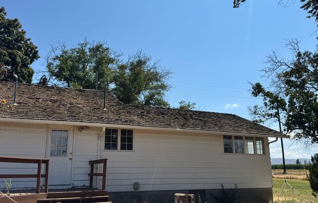 West Valley 3 bedroom country home with 3 bay shop