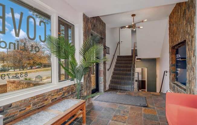 A house with a staircase leading to the second floor.