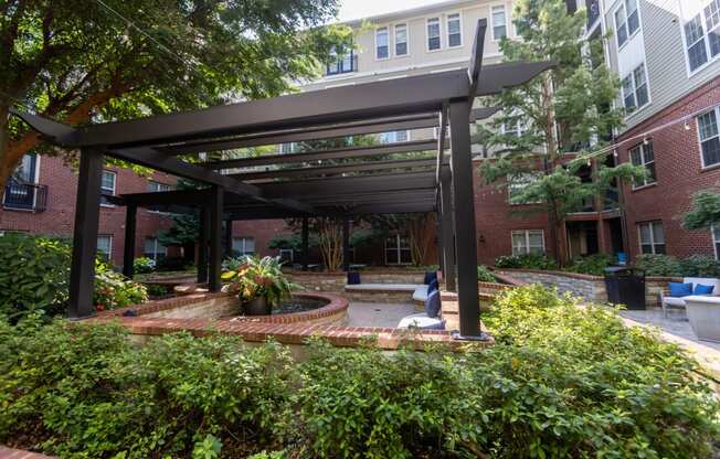 a view of a courtyard with a black structure