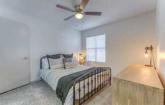a bedroom with a bed at Brightwaters Apartments, Little Rock, AR