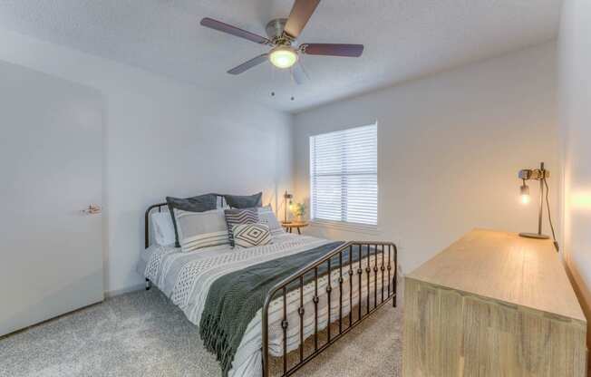 a bedroom with a bed at Brightwaters Apartments, Little Rock, AR