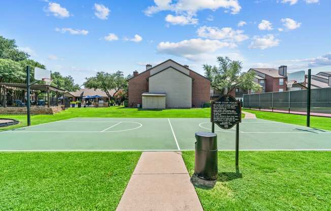 basketball court at the whispering winds apartments in pearland, tx