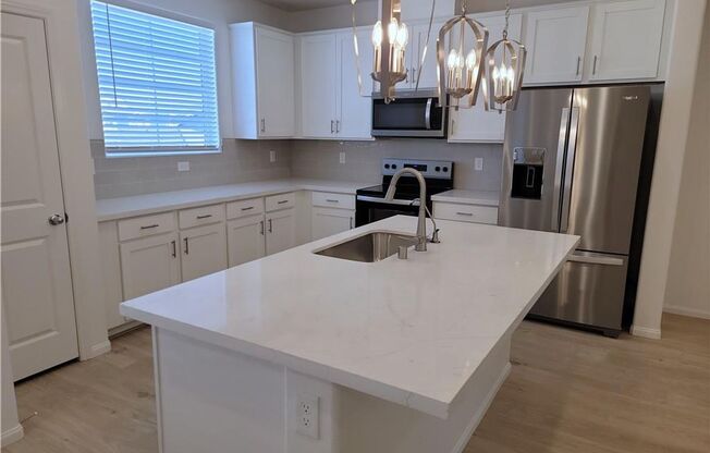 Modern Cadence Townhome with First-Floor Primary Suite, Solar & Resort-Style Amenities!