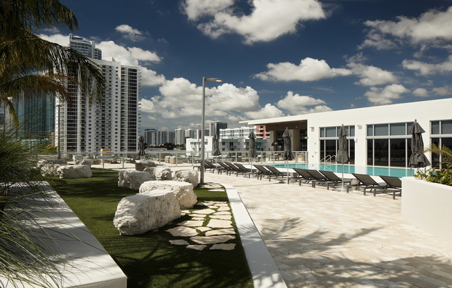 Rooftop deck with poolside seating