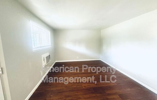 719 S TROOST AVE