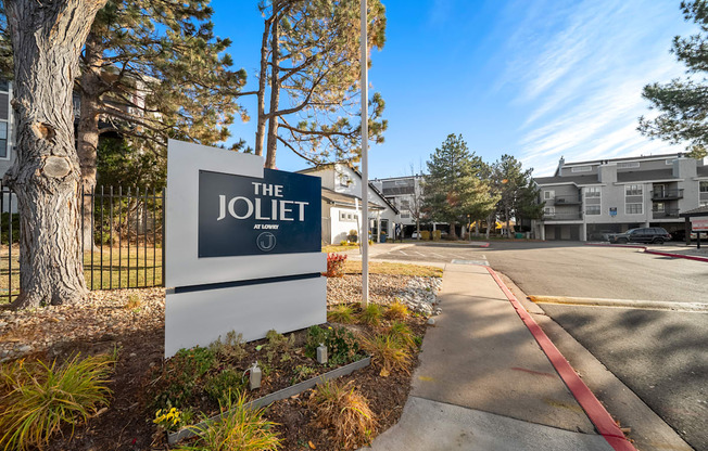 The Joliet sign is white with black lettering.