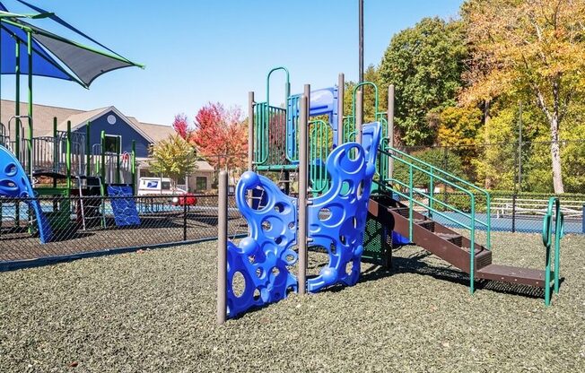 Playground with large sand-filled areas.