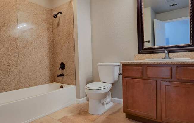 bathroom with travertine in Briarwood floor plan