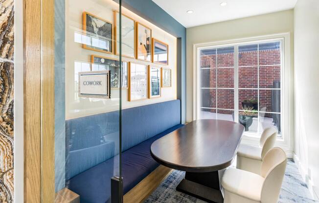 Stand-alone coworking offices with comfortable seating areas and private workstations.